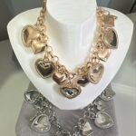 PULSEIRA ELEGANCE CORAÇÃO PRT GOLD