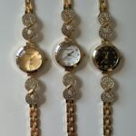 RELÓGIO DORADO INFINITO