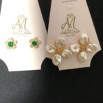 BRINCOS DOURADO FLOR