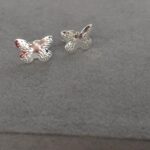 BRINCO INFANTIL BORBOLETA PRATA